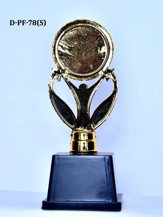 Champion trophy cup with ribbons
